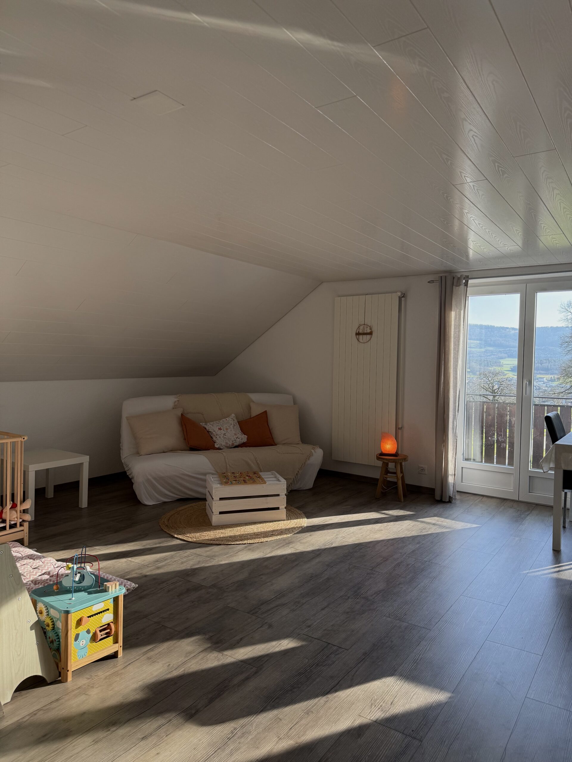 woman doing yoga meditation on brown parquet flooring